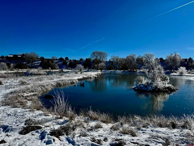 a view of a lake in middle of the town