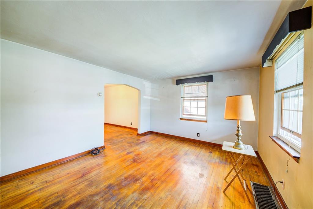 228 East Garden Road Pittsburgh, PA 15227 - Photo 6 of 21 living room open to the dining room