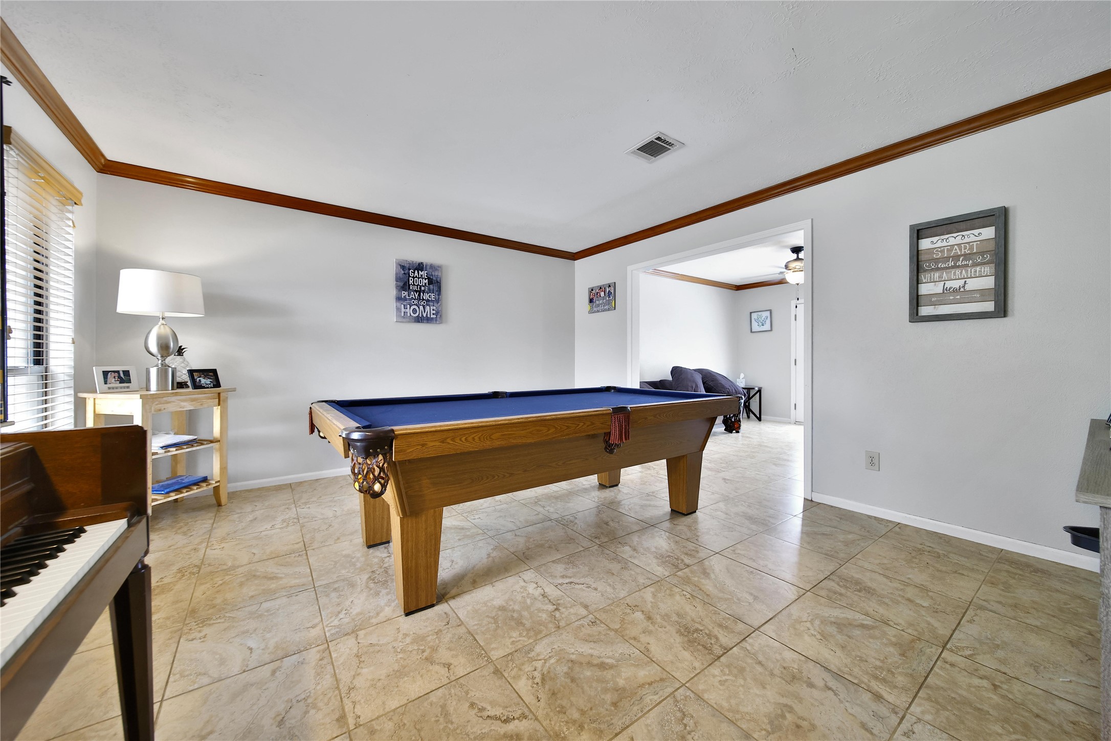 810 Noble Springs Road Houston, TX 77062 - Photo 11 of 27 a room with furniture and air hockey table