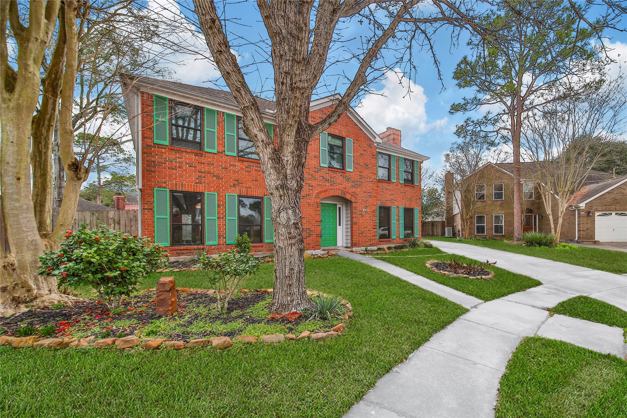 810 Noble Springs Road Houston, TX 77062 - Photo 2 of 27 a front view of a house with a yard