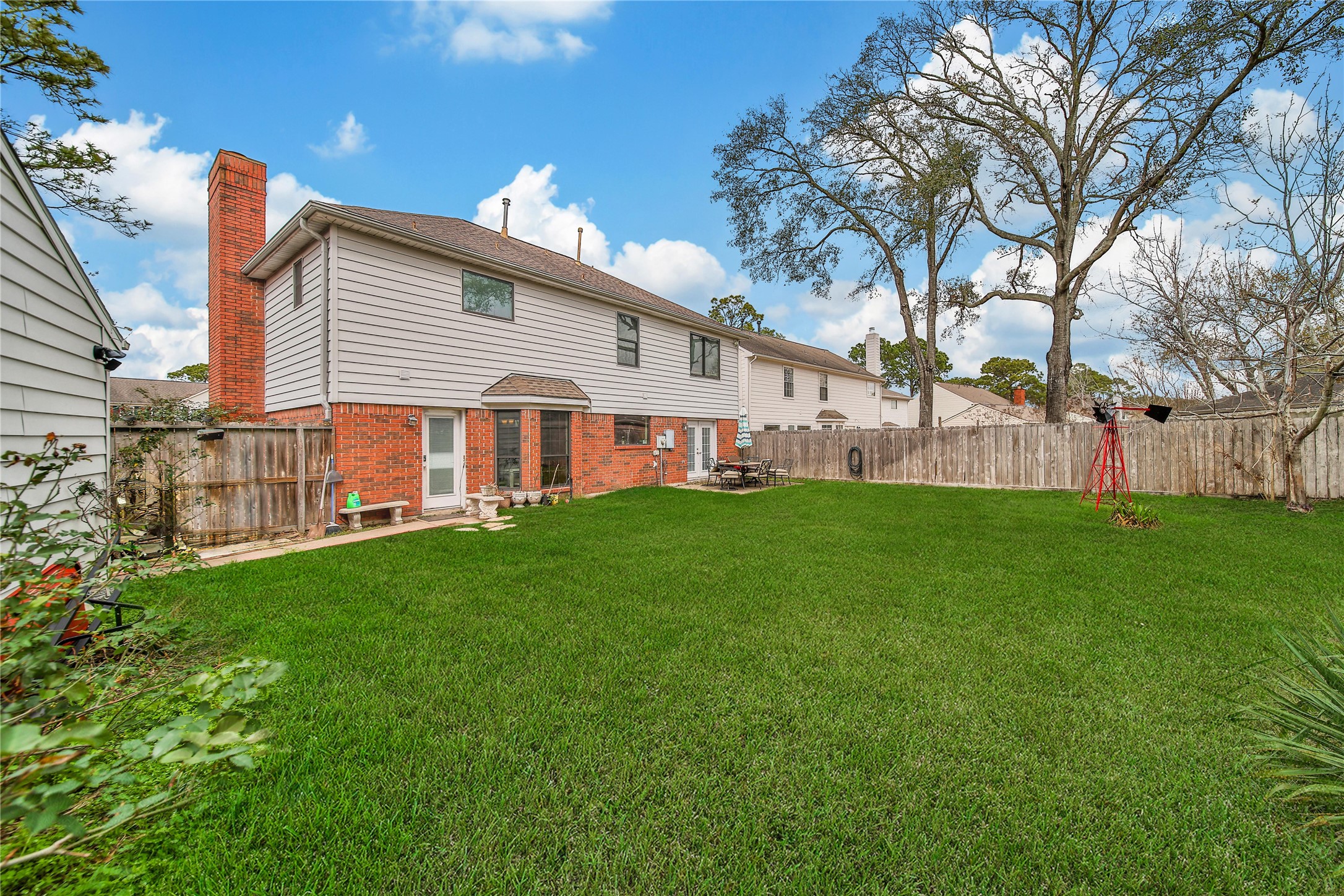 810 Noble Springs Road Houston, TX 77062 - Photo 27 of 27 a view of a house with a yard