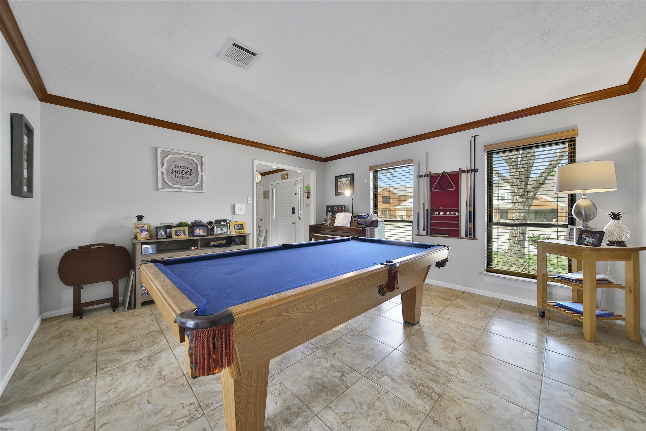 810 Noble Springs Road Houston, TX 77062 - Photo 10 of 27 a room with furniture pool table and windows