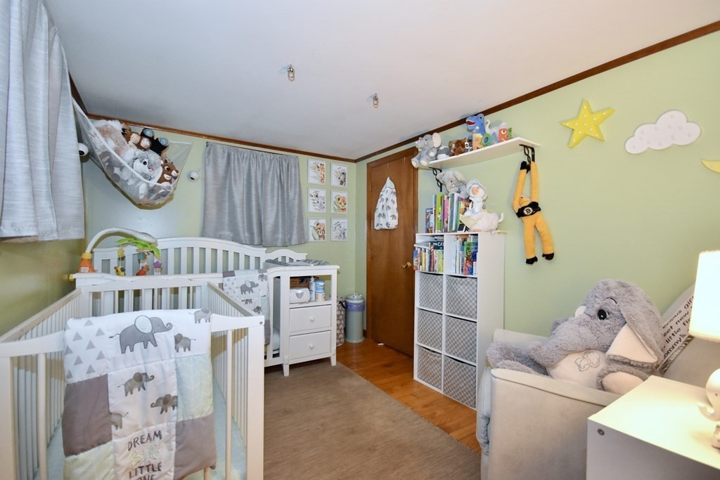 23 Trask Road Plymouth, MA 02360 - Photo 17 of 20 a bedroom with a bed and a window