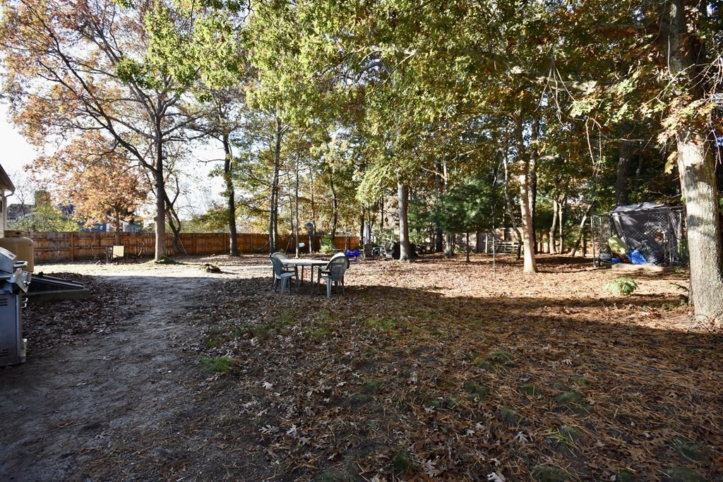 23 Trask Road Plymouth, MA 02360 - Photo 19 of 20 a view of road with trees