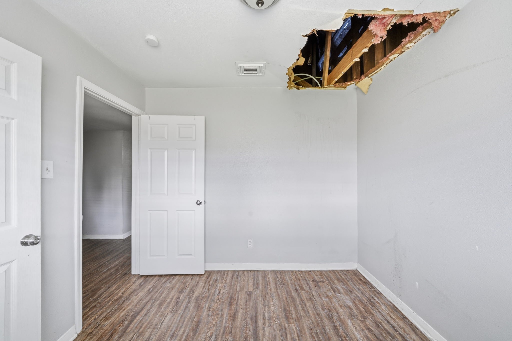 6410 Hopper Road Houston, TX 77016 - Photo 19 of 28 a view of walk in closet with clothes and shoes