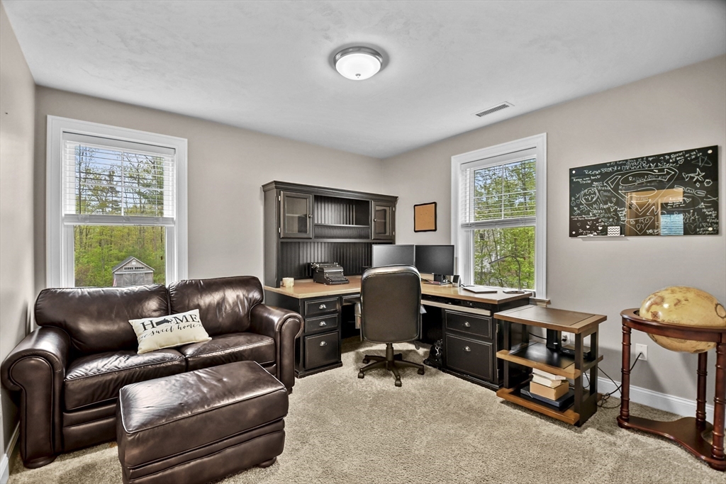 184 Glenwood Road Rutland, MA 01543 - Photo 23 of 41 a livingroom with workspace and a window