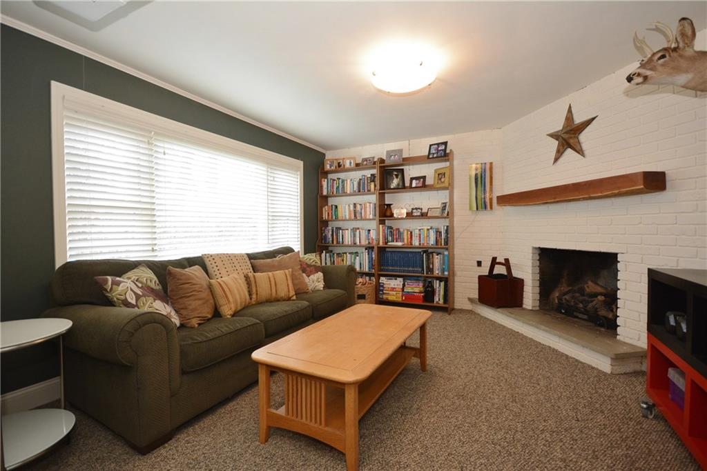 520 Fort Couch Road Pittsburgh, PA 15241 - Photo 21 of 25 a living room with furniture and a fireplace