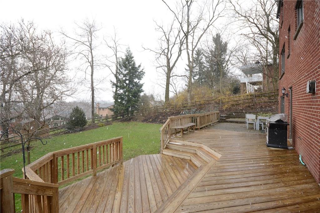 520 Fort Couch Road Pittsburgh, PA 15241 - Photo 23 of 25 a view of a wooden deck and trees with wooden floor and fence