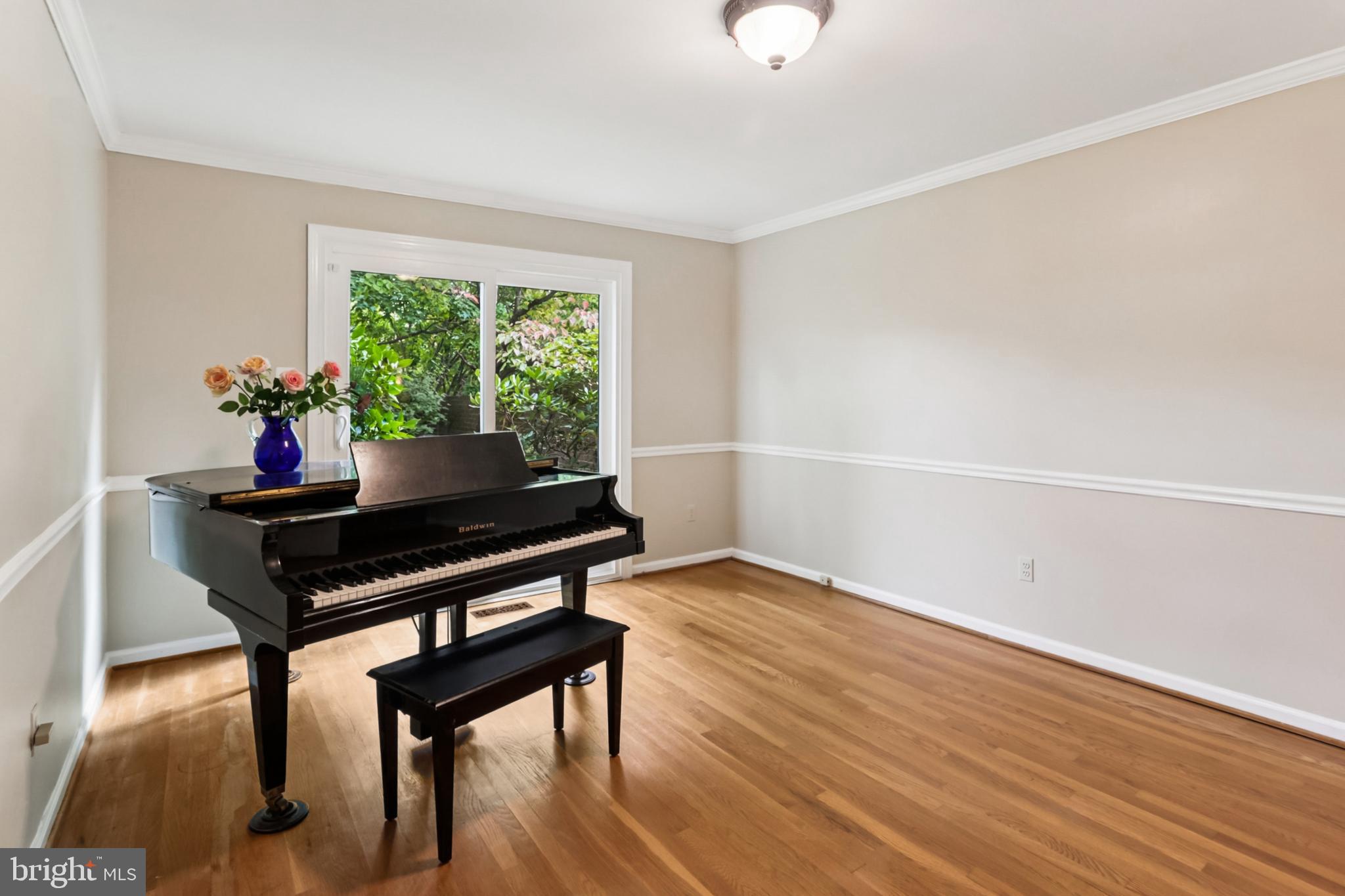 10233 Gainsborough Road Potomac, MD 20854 - Photo 16 of 50 a living room with furniture and a wooden floor