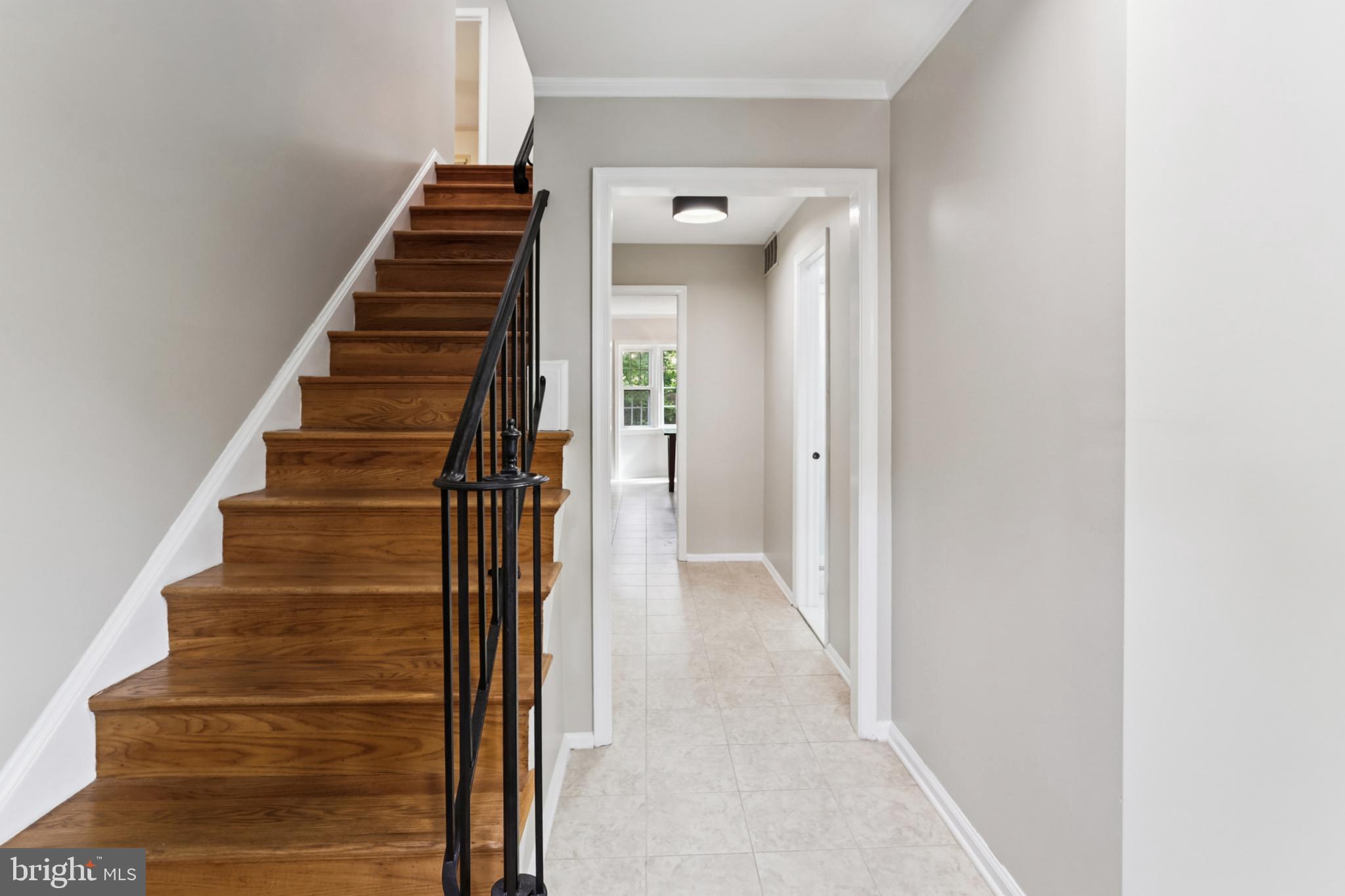10233 Gainsborough Road Potomac, MD 20854 - Photo 23 of 50 a view of entryway and hall with wooden floor