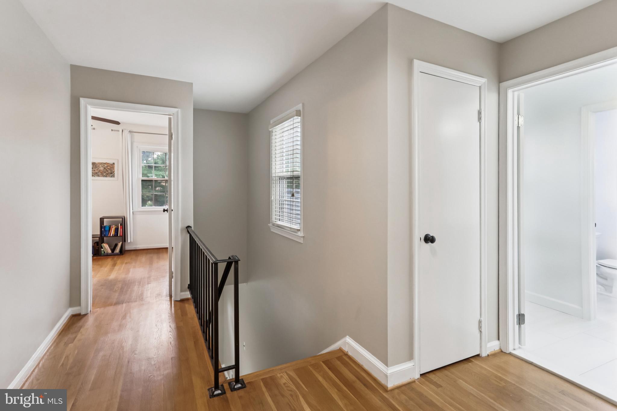 10233 Gainsborough Road Potomac, MD 20854 - Photo 24 of 50 a view of a room with wooden floor and bedroom