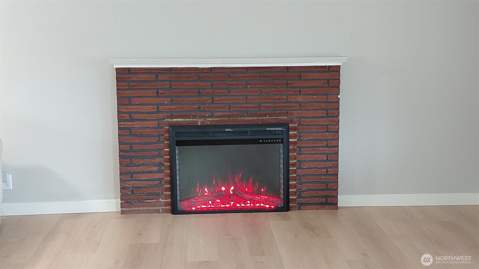 613 South 318th Place Federal Way, WA 98003 - Photo 3 of 17 a stone fireplace with a fireplace