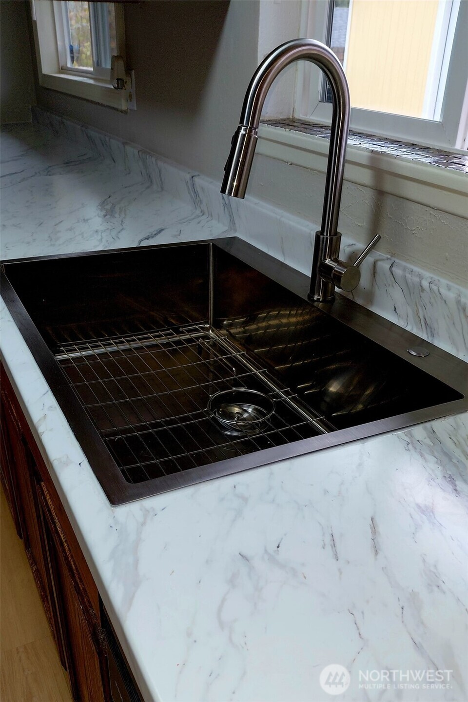 613 South 318th Place Federal Way, WA 98003 - Photo 6 of 17 a close up of a stove top oven and sink