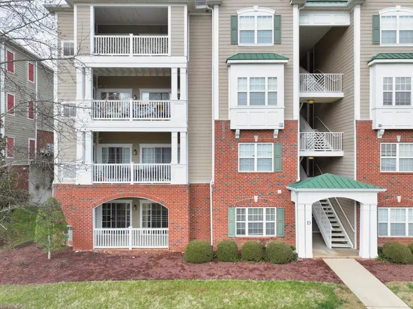 a front view of a house having yard