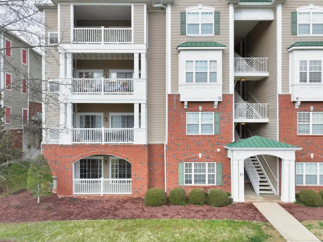 a kitchen with a stove and a microwave