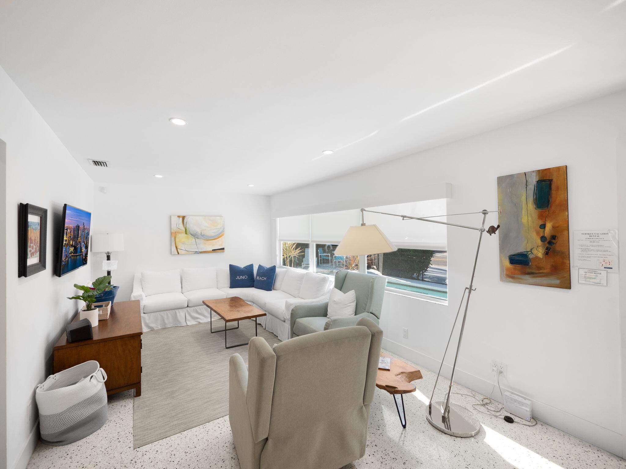 471 Mars Way Juno Beach, FL 33408 - Photo 14 of 29 a living room with furniture and a couch