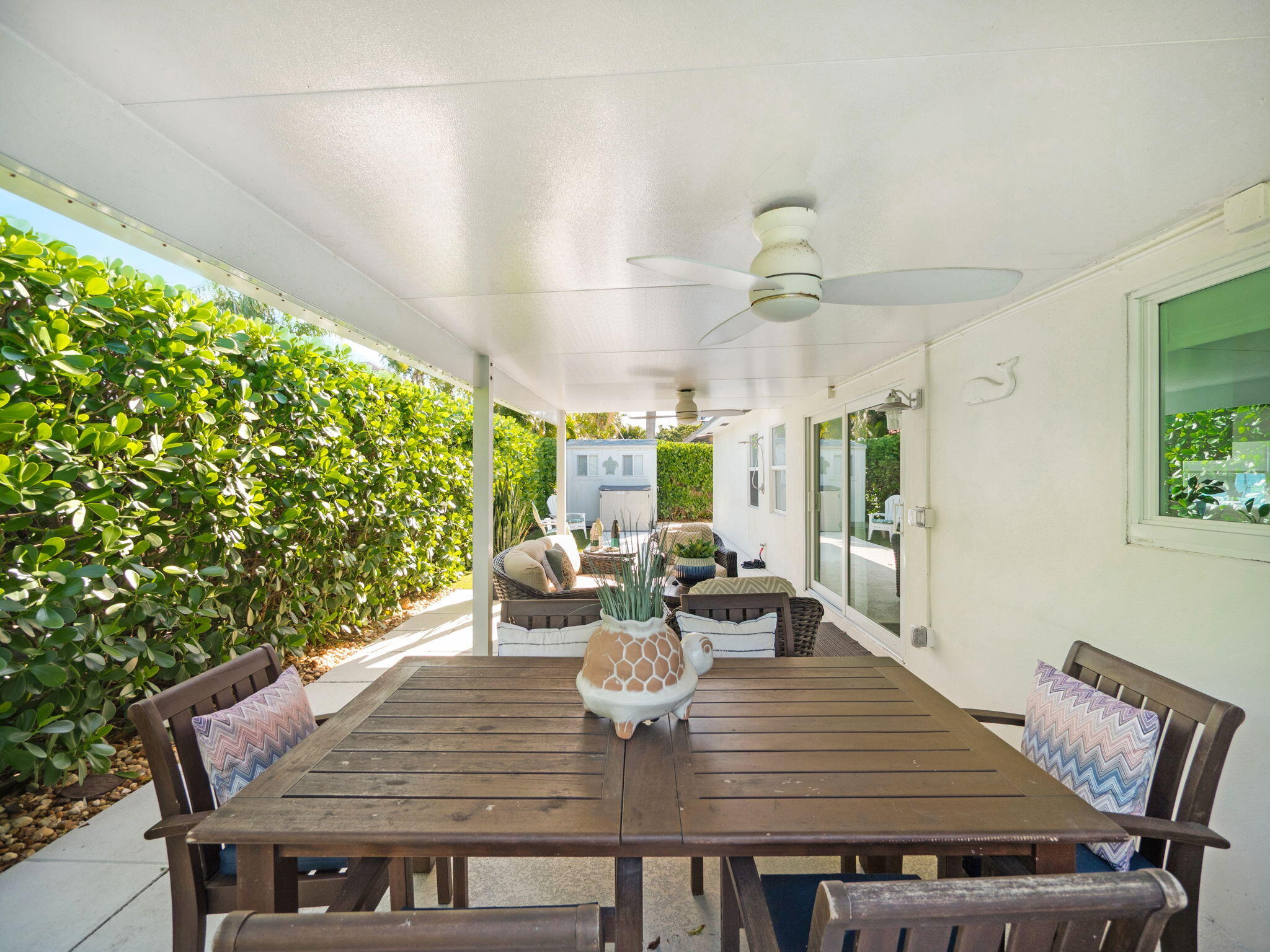 471 Mars Way Juno Beach, FL 33408 - Photo 24 of 29 a view of a dining room with furniture window and outside view