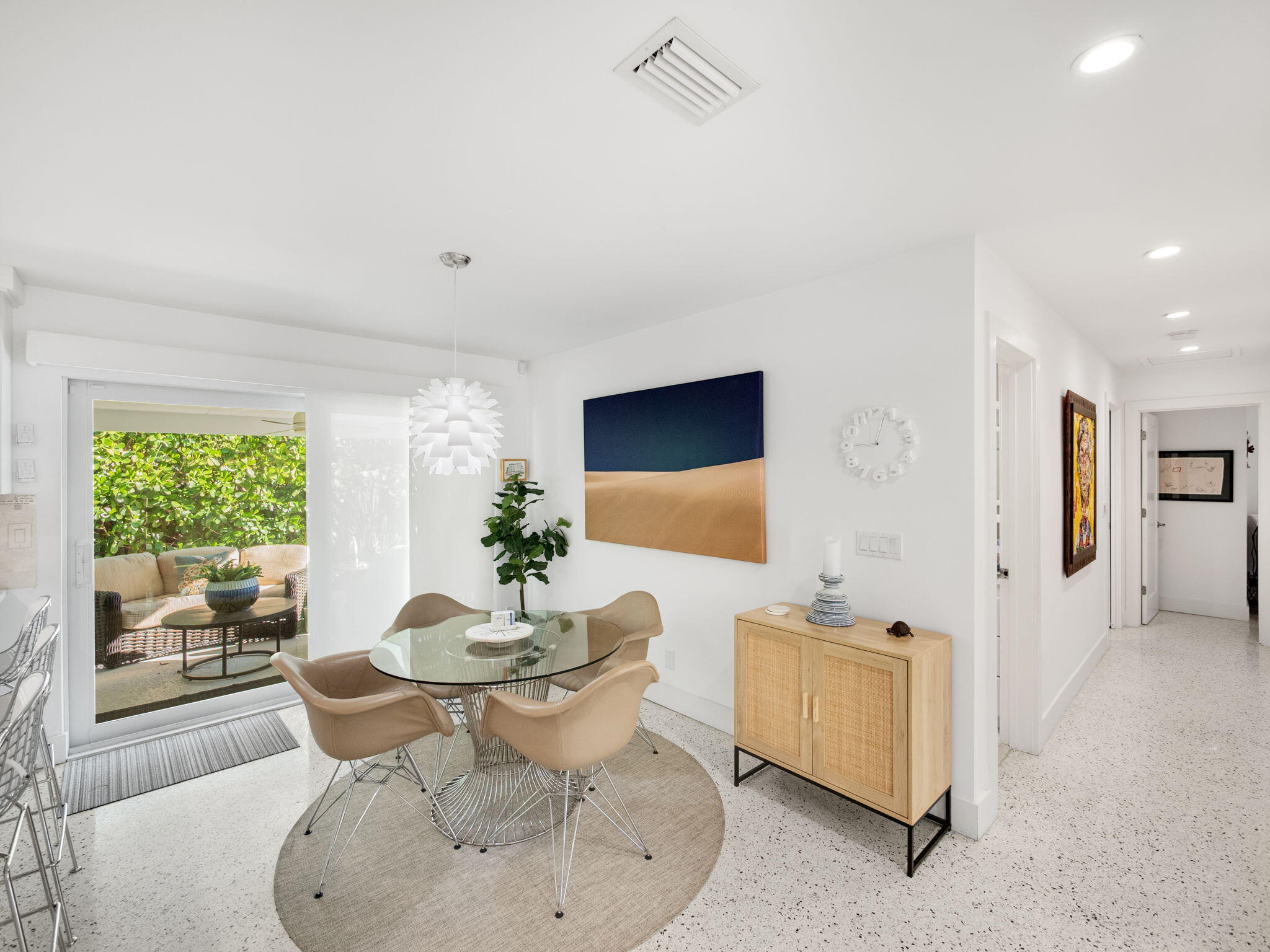 471 Mars Way Juno Beach, FL 33408 - Photo 10 of 29 a living room with furniture and a large window