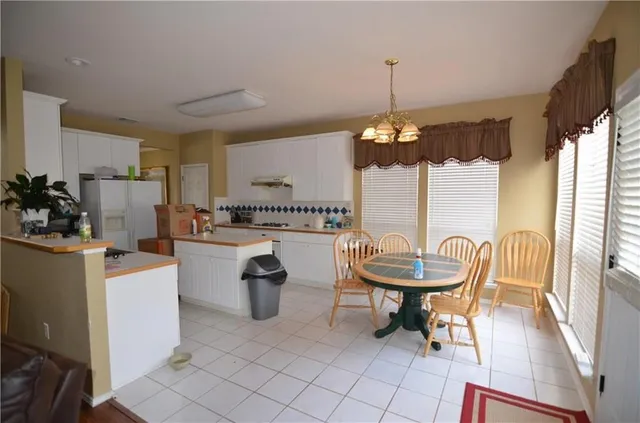 a living room with a couch and a table