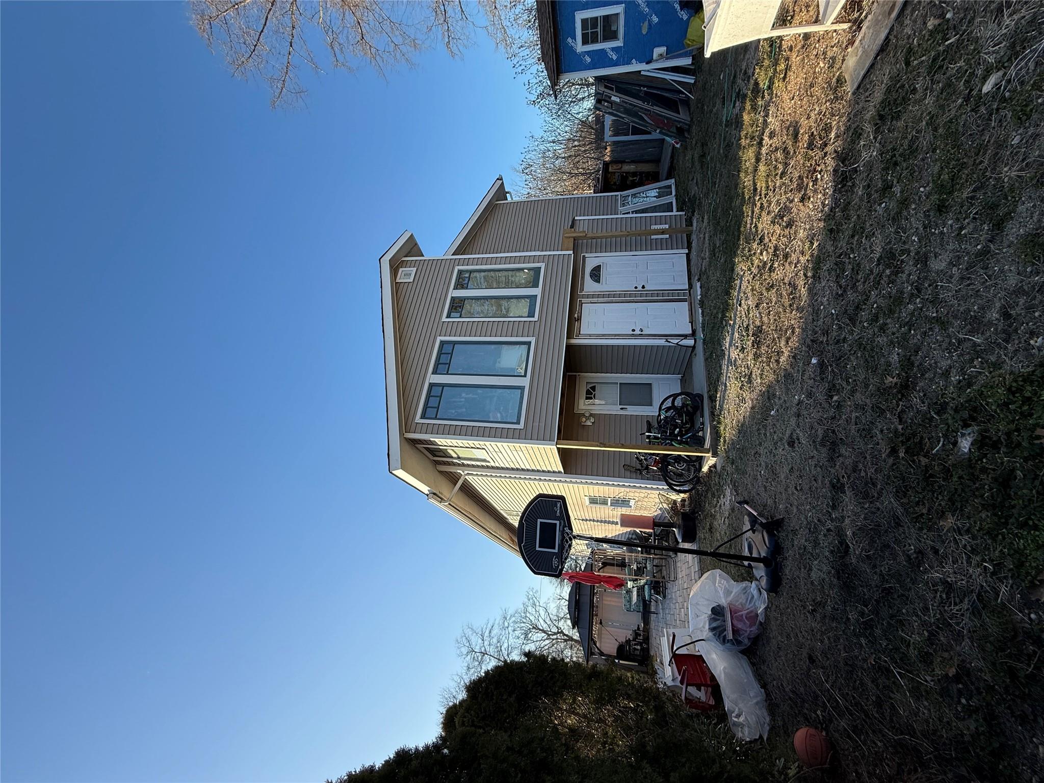 17 Hampton Road Shirley, NY 11967 - Photo 25 of 26 Back of house with a patio area