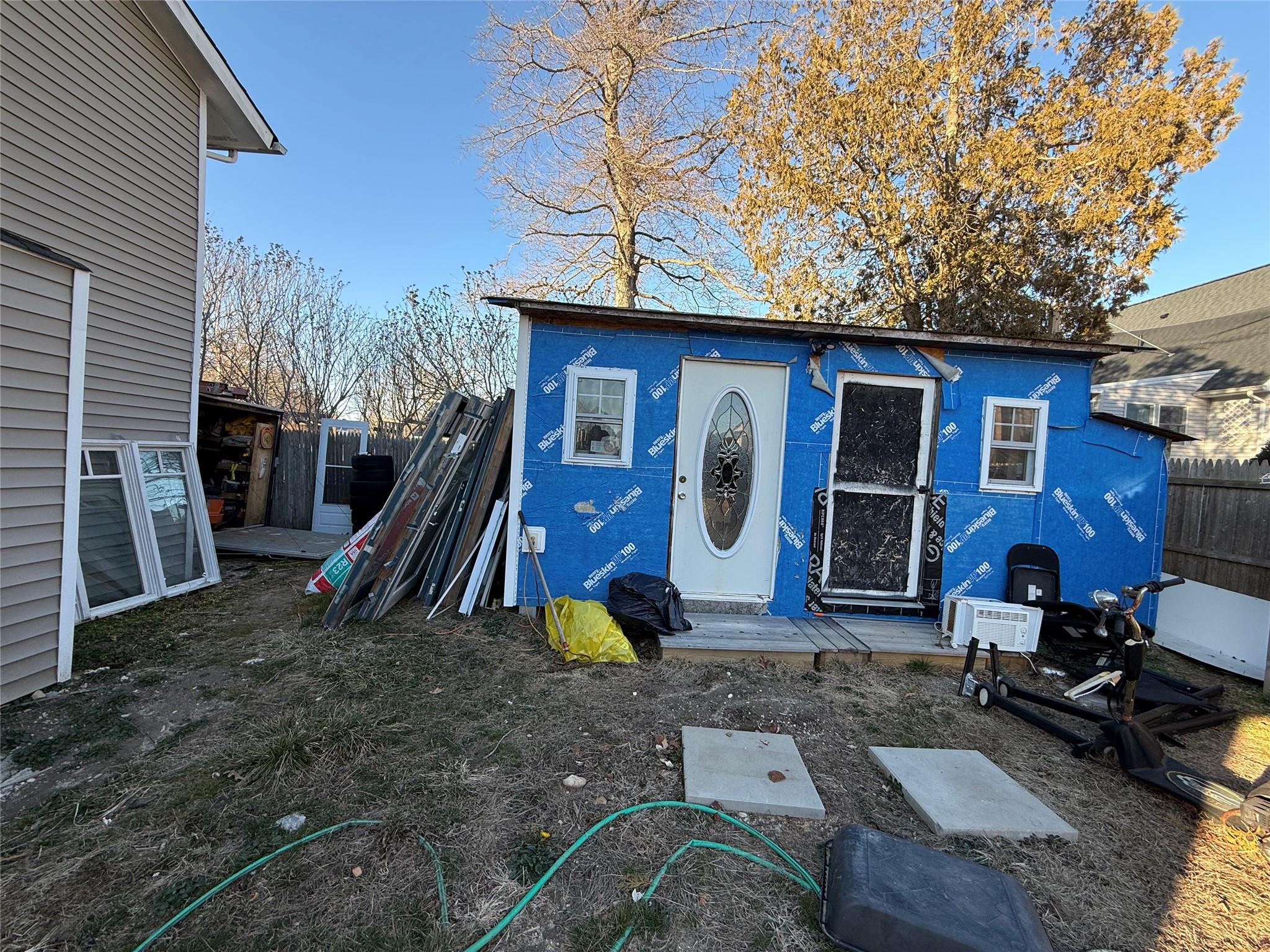 17 Hampton Road Shirley, NY 11967 - Photo 26 of 26 View of outdoor structure featuring fence and an outbuilding