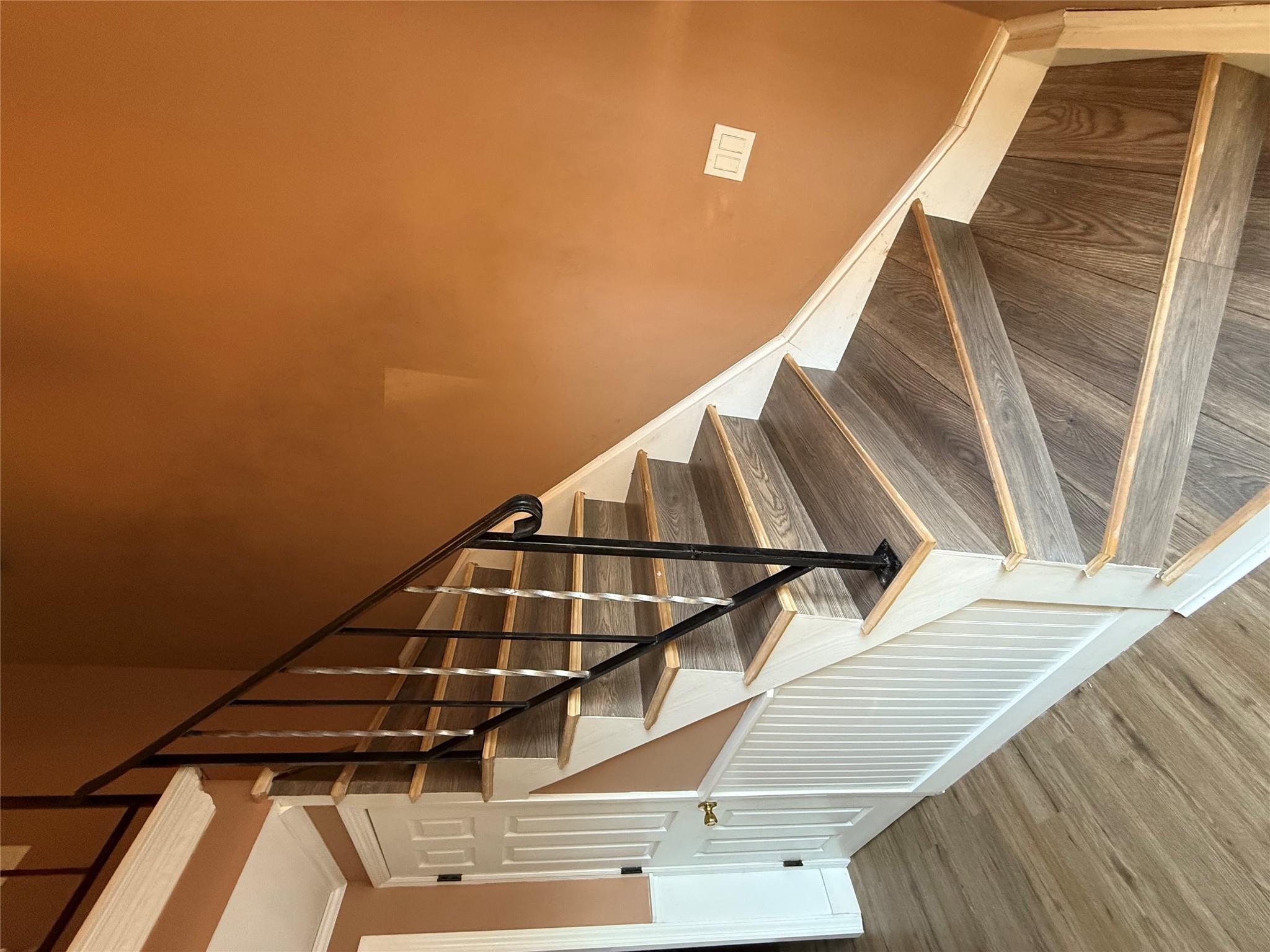 17 Hampton Road Shirley, NY 11967 - Photo 3 of 26 Staircase with ornamental molding, wainscoting, and wood finished floors