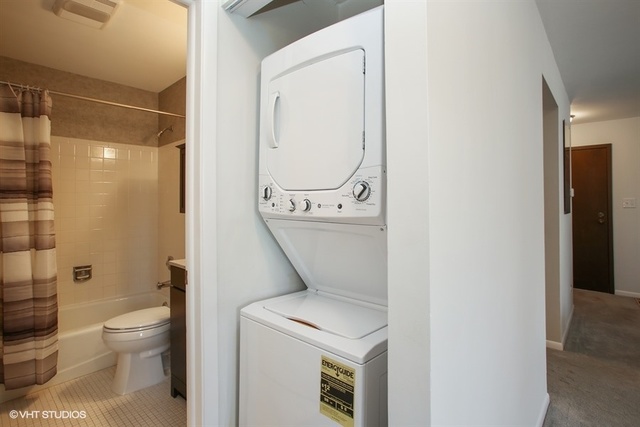 611 West Central Road, Unit C5 Mount Prospect, IL 60056 - Photo 10 of 10 a bathroom with a toilet sink and shower
