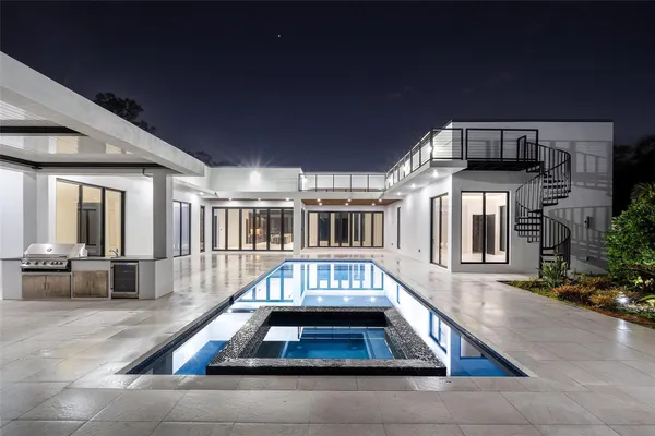 a view of a backyard of the house