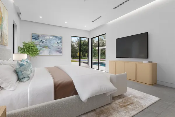 wooden floor in an empty room with a large window