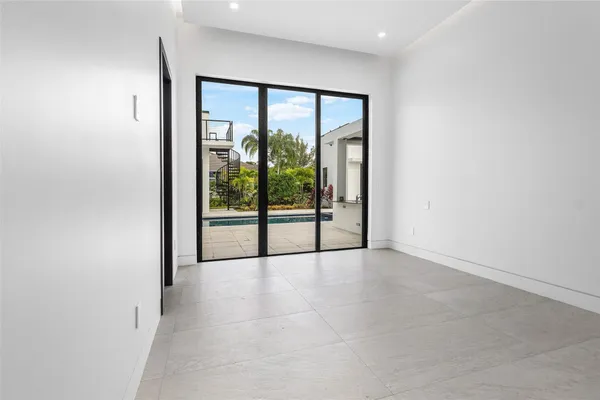 a view of a room with a large window