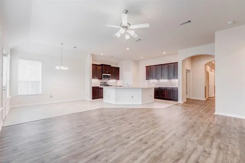 a kitchen with a stove and a sink