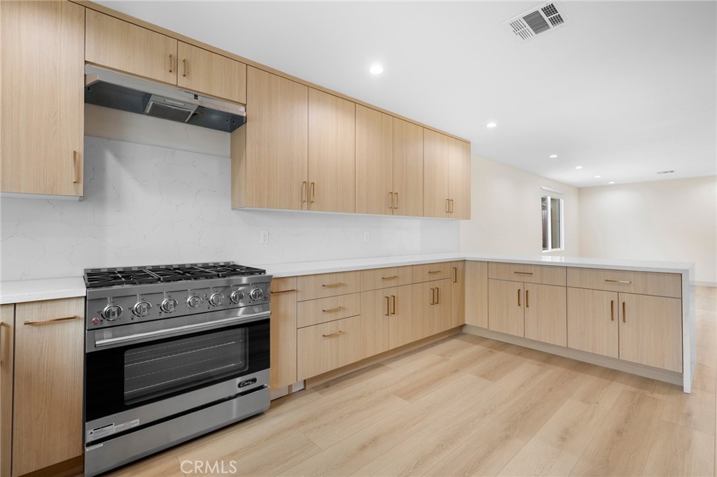 918 University Burbank, CA 91504 - Photo 14 of 30 a kitchen with white cabinets and white appliances