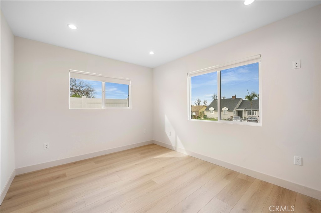 918 University Burbank, CA 91504 - Photo 20 of 30 a view of room with window and wooden floor
