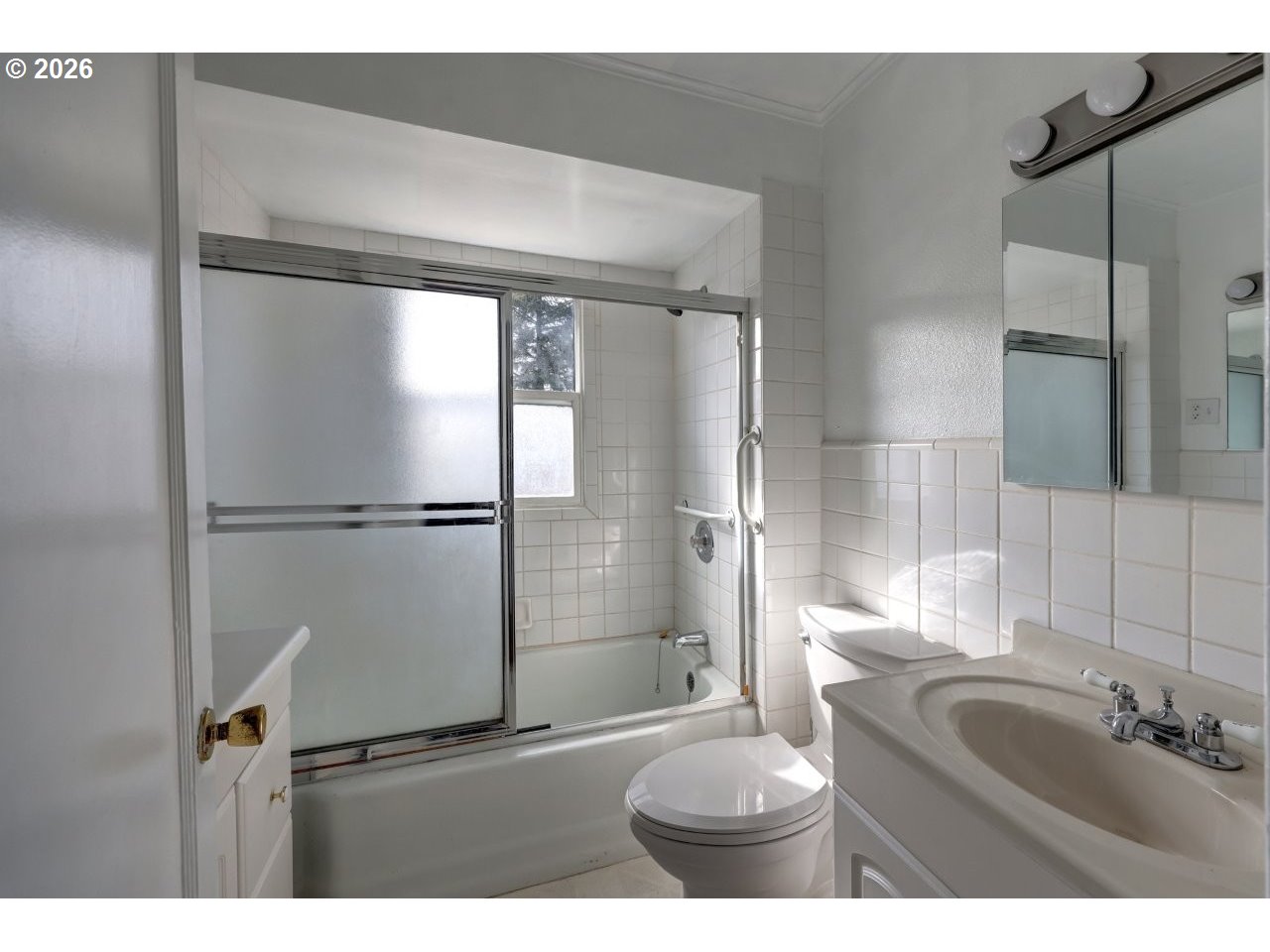 135 Southwest 2nd Street Warrenton, OR 97146 - Photo 26 of 46 a bathroom with a sink and a mirror