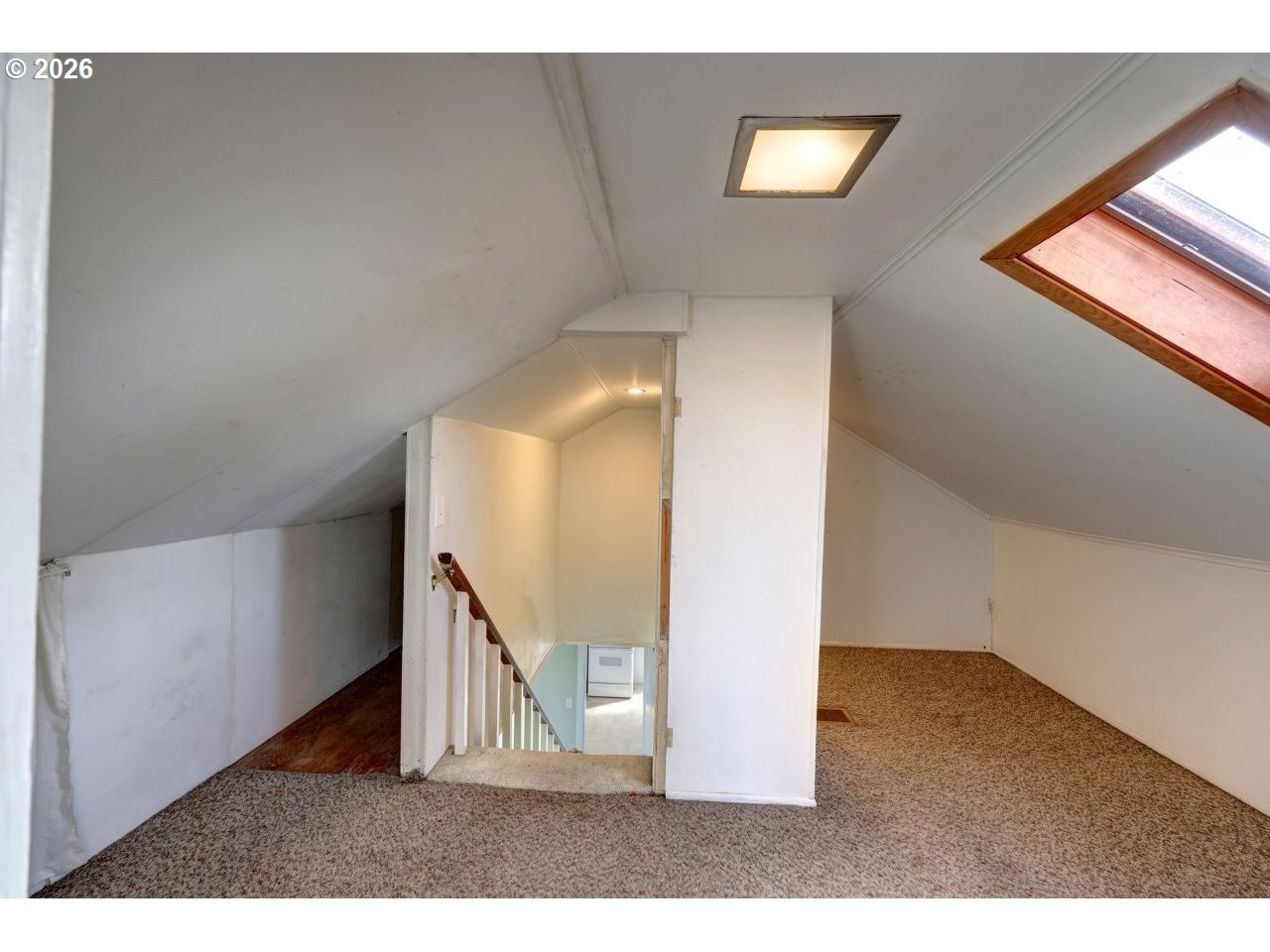 135 Southwest 2nd Street Warrenton, OR 97146 - Photo 34 of 46 a view of a hallway with staircase