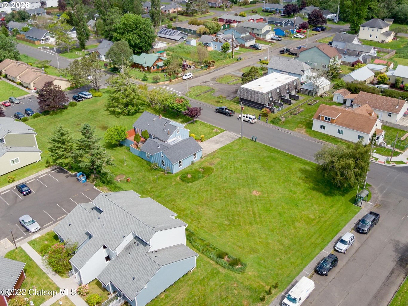 135 Southwest 2nd Street Warrenton, OR 97146 - Photo 4 of 46 an aerial view of residential houses with outdoor space