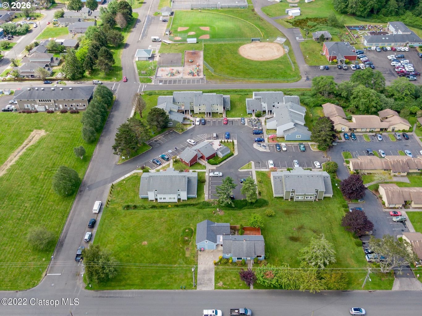 135 Southwest 2nd Street Warrenton, OR 97146 - Photo 7 of 46 an aerial view of residential houses with outdoor space and street view