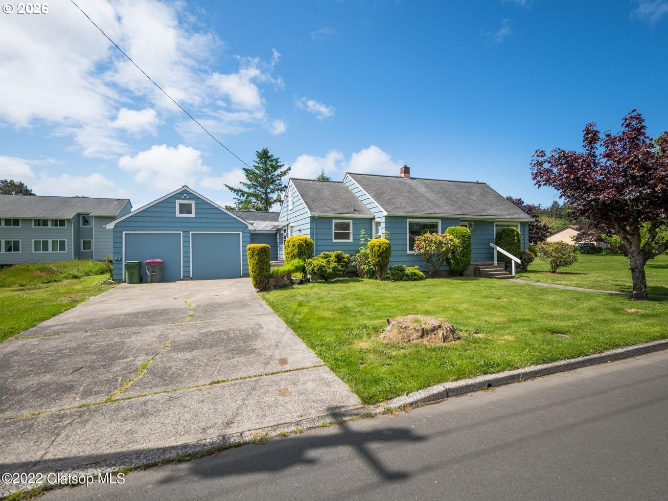 135 Southwest 2nd Street Warrenton, OR 97146 - Photo 9 of 46 a front view of house with yard