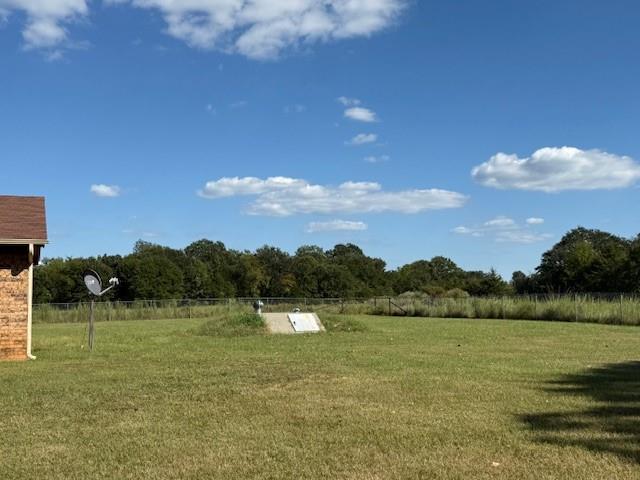 1643 North 4100th Road Soper, OK 74759 - Photo 20 of 30 a view of a lake with houses in the back