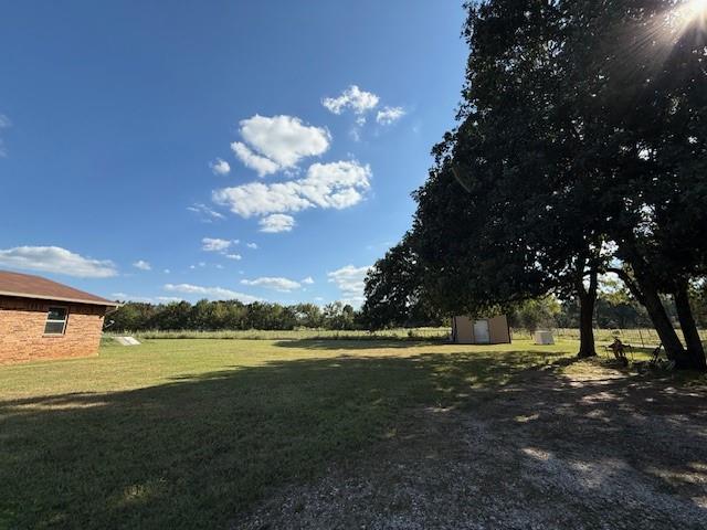 1643 North 4100th Road Soper, OK 74759 - Photo 30 of 30 a view of a lake with houses in the background