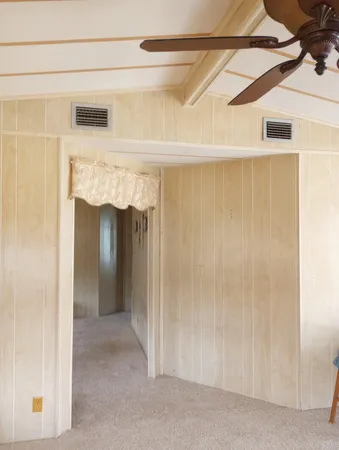 a view of entryway and kitchen