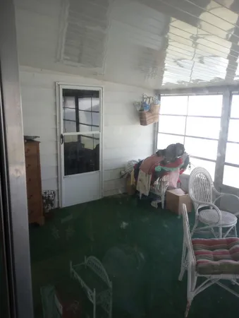 a room with a bed and a window