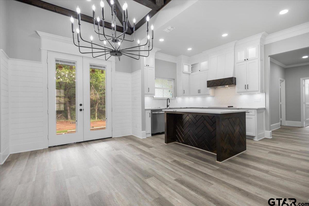 19462 Cedarpark Place Lindale, TX 75771 - Photo 11 of 48 a kitchen with a sink cabinets and wooden floor