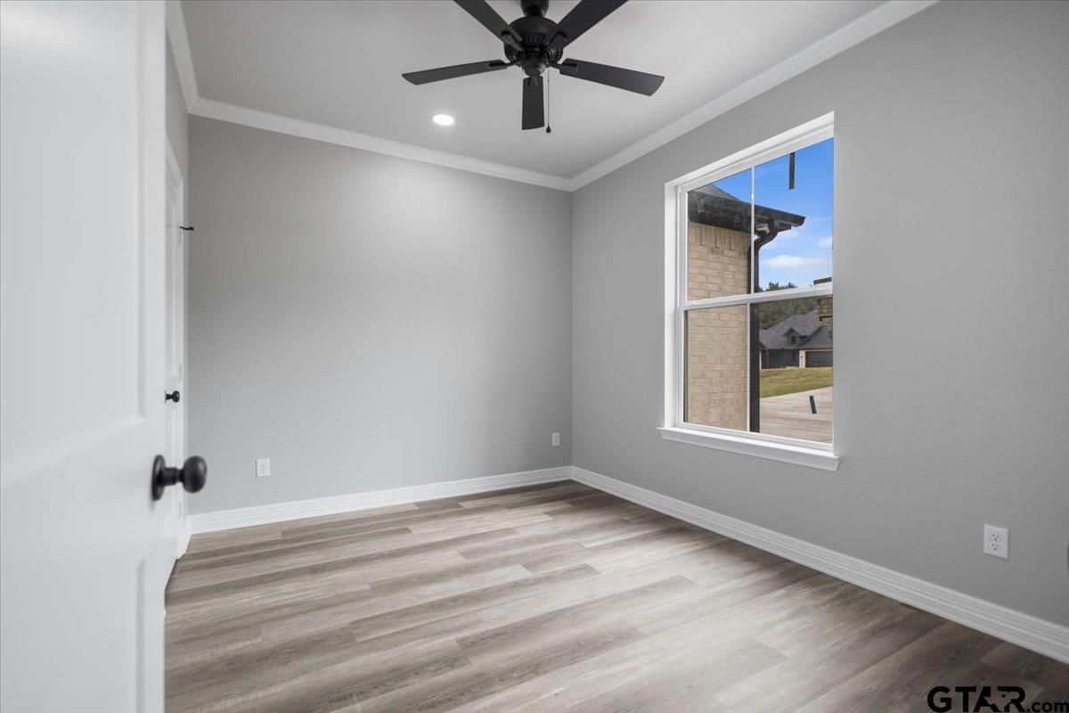 19462 Cedarpark Place Lindale, TX 75771 - Photo 18 of 48 a view of room with window and ceiling fan