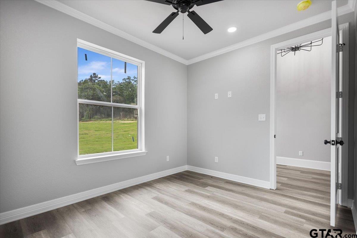 19462 Cedarpark Place Lindale, TX 75771 - Photo 19 of 48 an empty room with window and closet