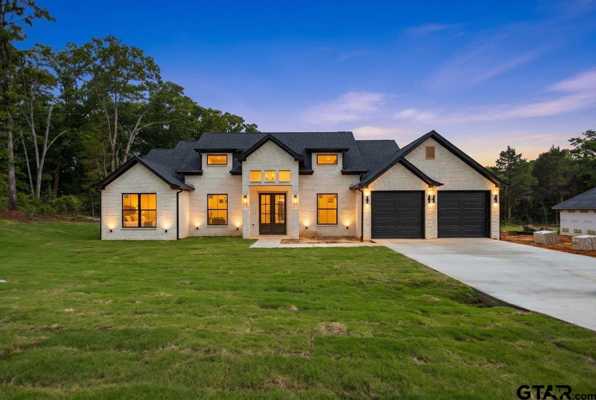 19462 Cedarpark Place Lindale, TX 75771 - Photo 2 of 48 a front view of a house with a yard