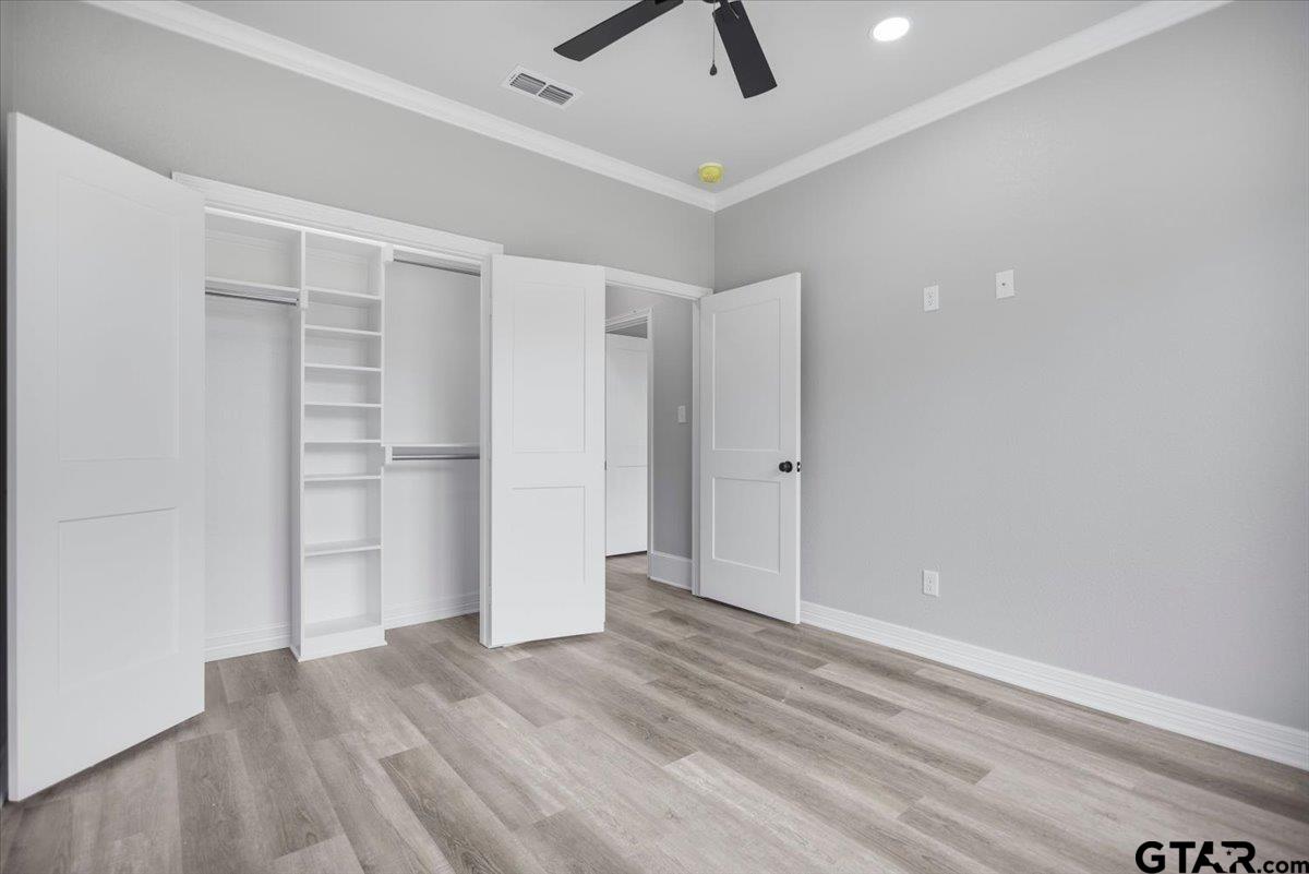 19462 Cedarpark Place Lindale, TX 75771 - Photo 40 of 48 wooden floor in an empty room