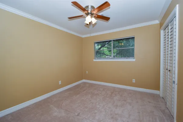 a view of a sink and a table in a room