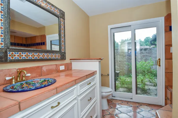 a bathroom with a sink and a toilet