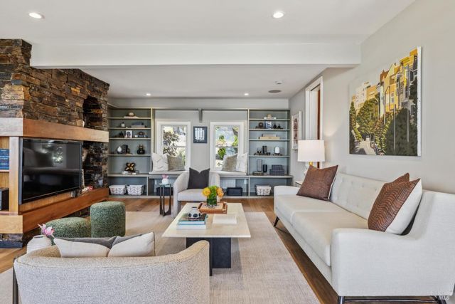 a view of a patio with table and chairs